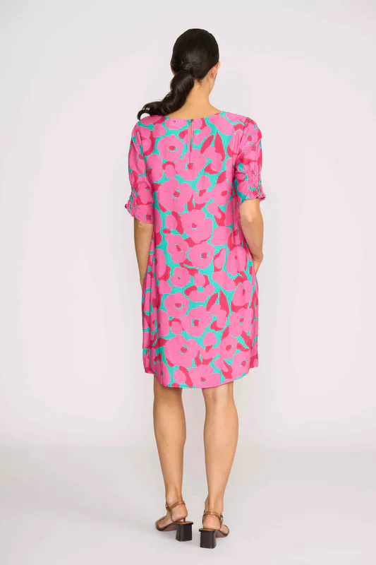 Model wearing Artful Dress - Shirr The Cuff By Foil Available at Beetees Nelson