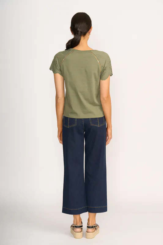 Model wearing Sage T-Shirt - Broderie Sleeve By Memo Available at Beetees Nelson