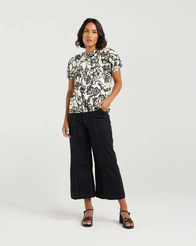 Model wearing Street Blossoms Kyla Top By Et Alia Available at Beetees Nelson