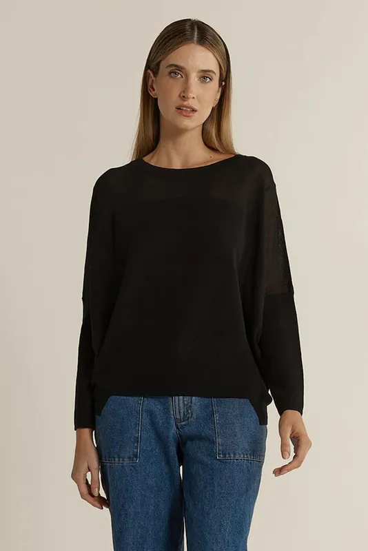 Model wearing Black Charlie Knit By Fate & Becker Available at Beetees Nelson