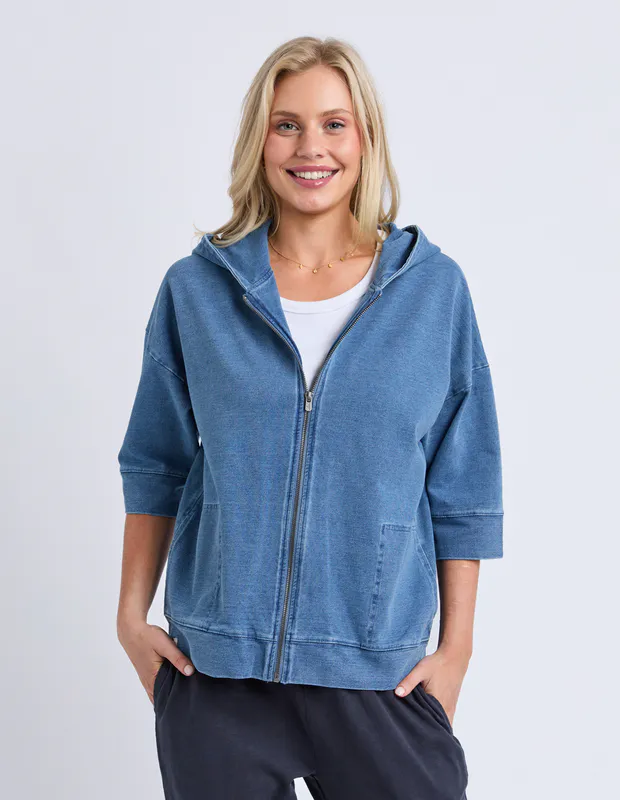 Model wearing Blue Tessa Denim Look Hoodie By Elm Available at Beetees Nelson