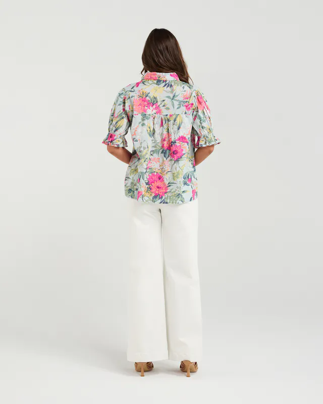 Model wearing Azealea Flower Bossa Top By NMBR Rose Available at Beetees Nelson