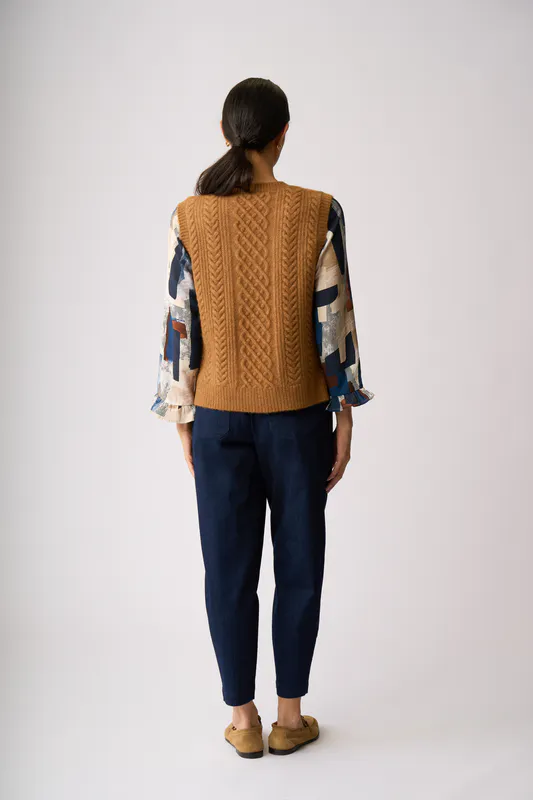 Model wearing Ginger Cable Knit Vest By Memo Available at Beetees Nelson