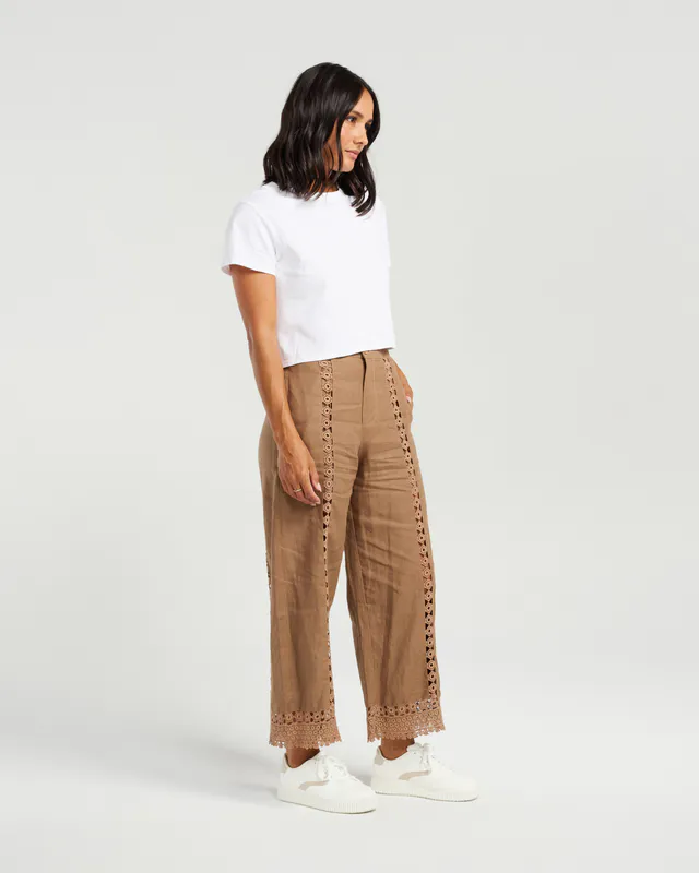 Model wearing Brown Flynn Pant By NMBR Rose Available at Beetees Nelson