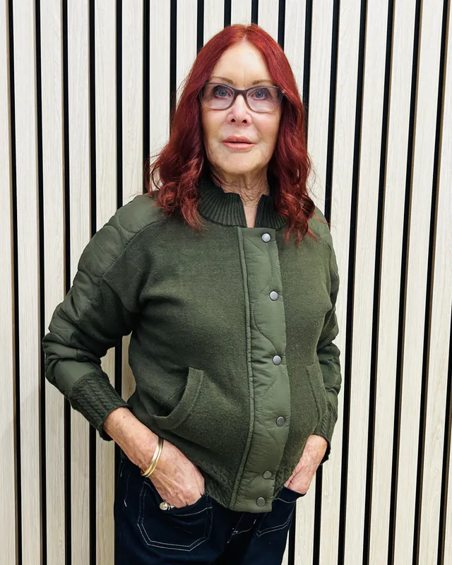 Model wearing Khaki Knit & Wowen Bomer Jacket By Oh Three Available at Beetees Nelson