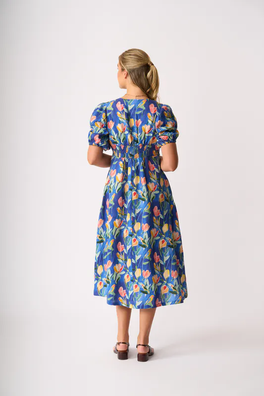 Model wearing Tropical Retreat Empire-Ly Yours Dress By Foil Available at Beetees Nelson