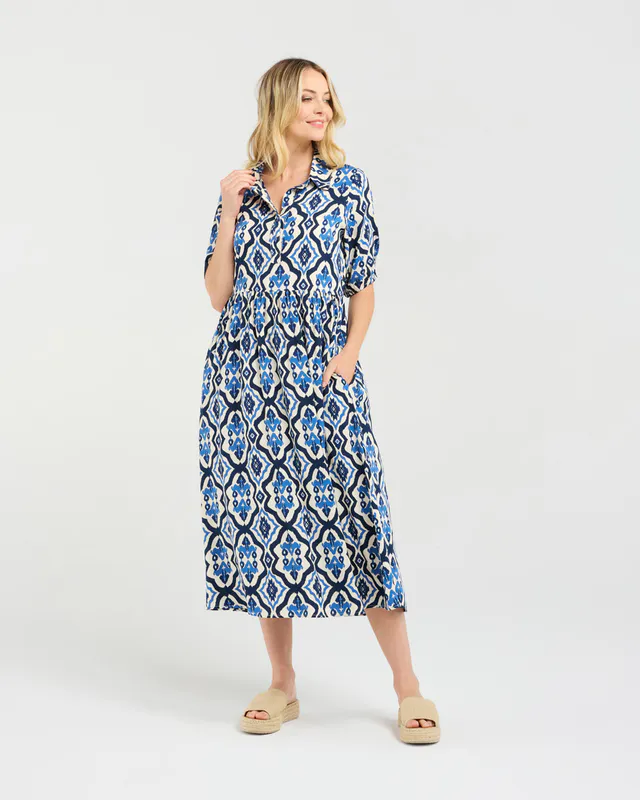 Model wearing Blue Aztec Genevieve Button Placket Dress By Blackstone Available at Beetees Nelson