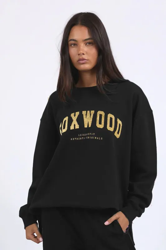 Model wearing Black/Gold Metallic Intervel Crew By Foxwood Available at Beetees Nelson
