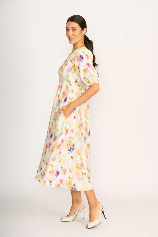 Model wearing Mist Floral Empire-Ly Yours Dress By Foil Available at Beetees Nelson