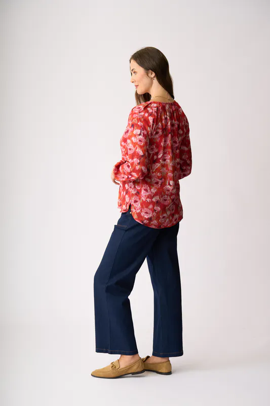 Model wearing Winter Blooms Razzle Dazzle Top By Preen Available at Beetees Nelson