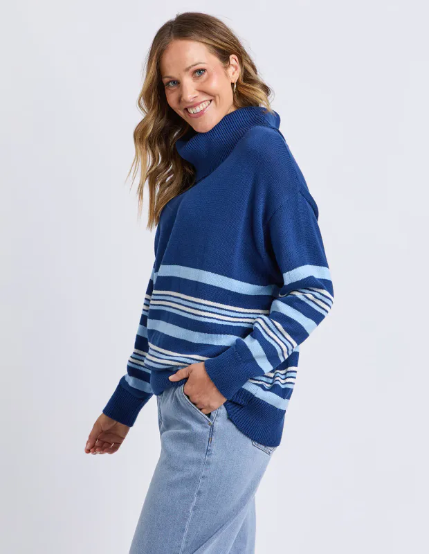 Model wearing Navy Striped Roll Neck Sweater By Elm Available at Beetees Nelson