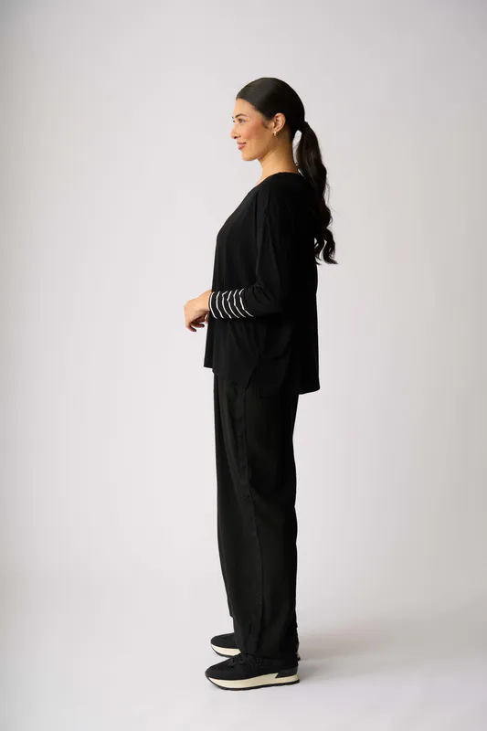 Model wearing Lucky Clover Blocked Stripe Top By Foil Available at Beetees Nelson