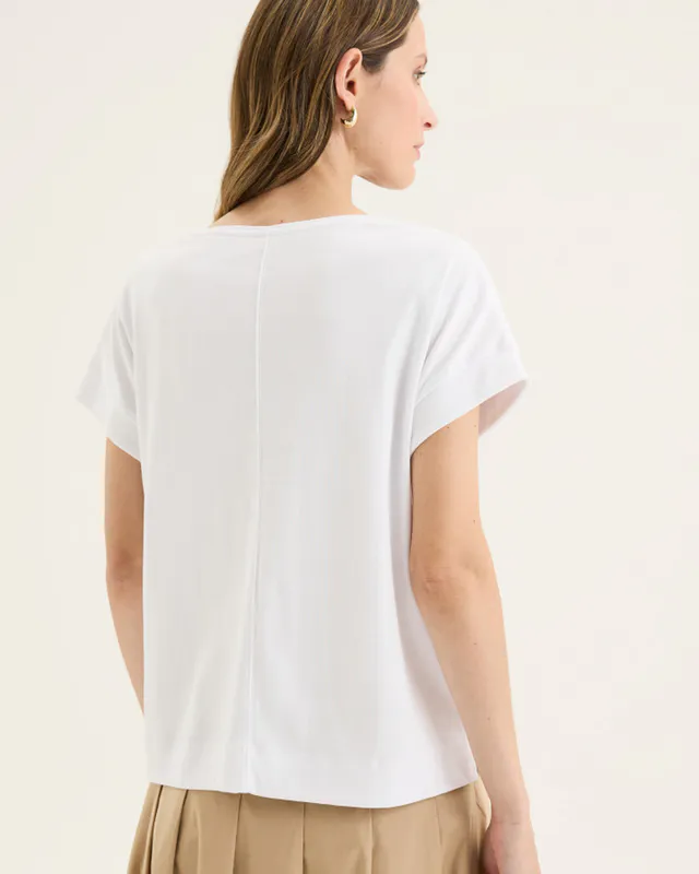 Model wearing White Solitude Tee By Yarra Trail Available at Beetees Nelson