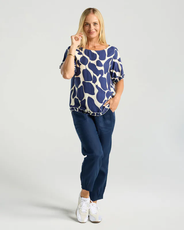 Model wearing Ink Cobblestones Lydia Frill Top By Blackstone Available at Beetees Nelson