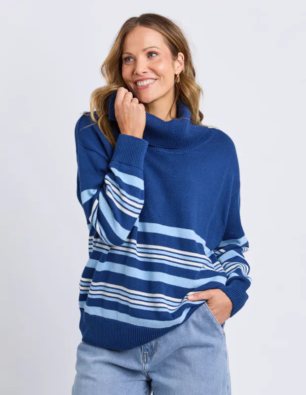 Model wearing Navy Striped Roll Neck Sweater By Elm Available at Beetees Nelson