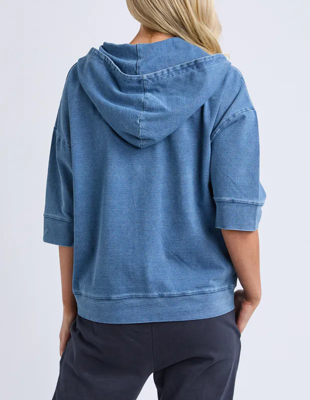 Model wearing Blue Tessa Denim Look Hoodie By Elm Available at Beetees Nelson