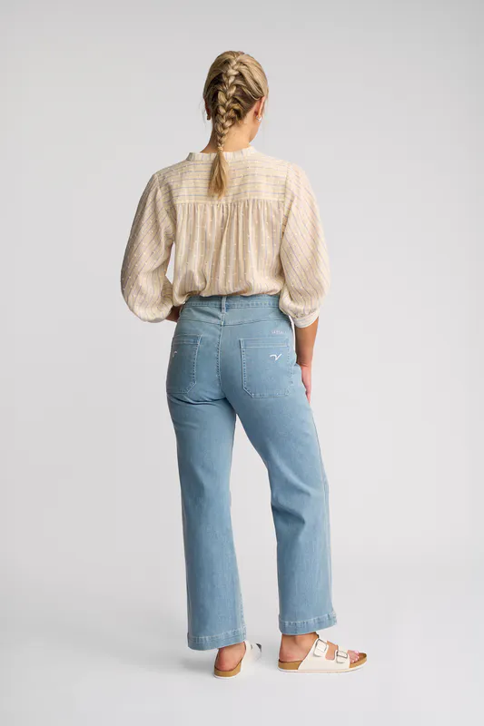 Model wearing Light Wash Denim Villa Jean By Vassalli Available at Beetees Nelson