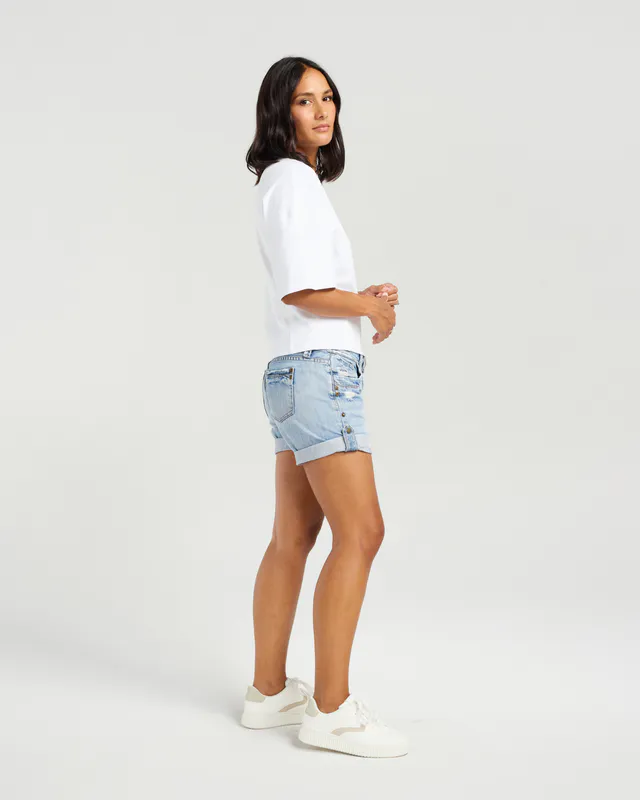 Model wearing White Kendell T-shirt By NMBR Rose Available at Beetees Nelson