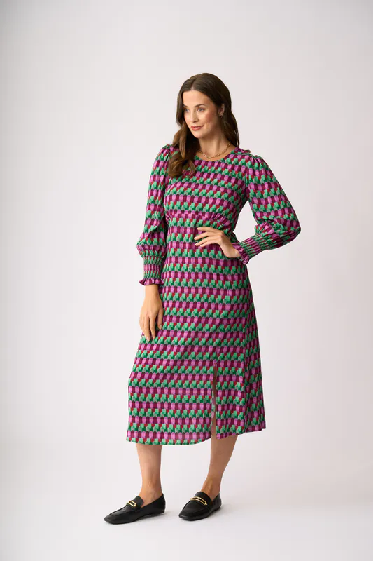 Model wearing Art Deco Curved & Shirred Dress By Foil Available at Beetees Nelson