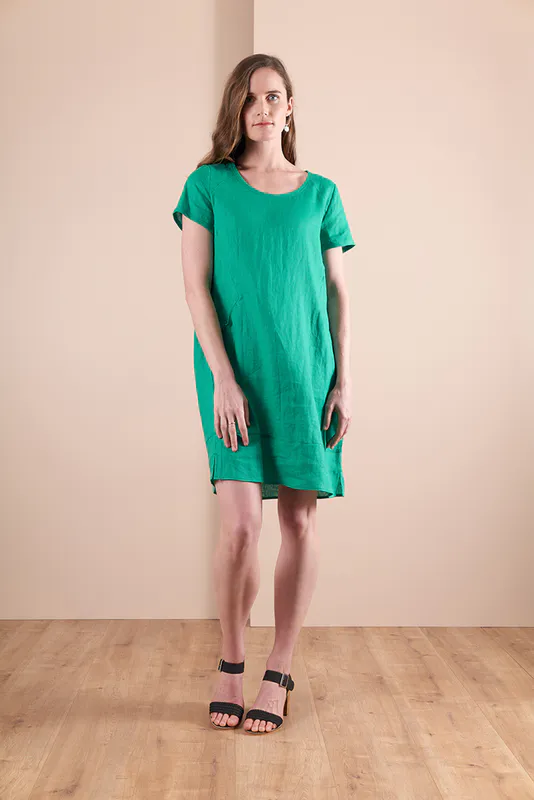 Model wearing Green Coloured Dress - Panel Lines By Foil Available at Beetees Nelson