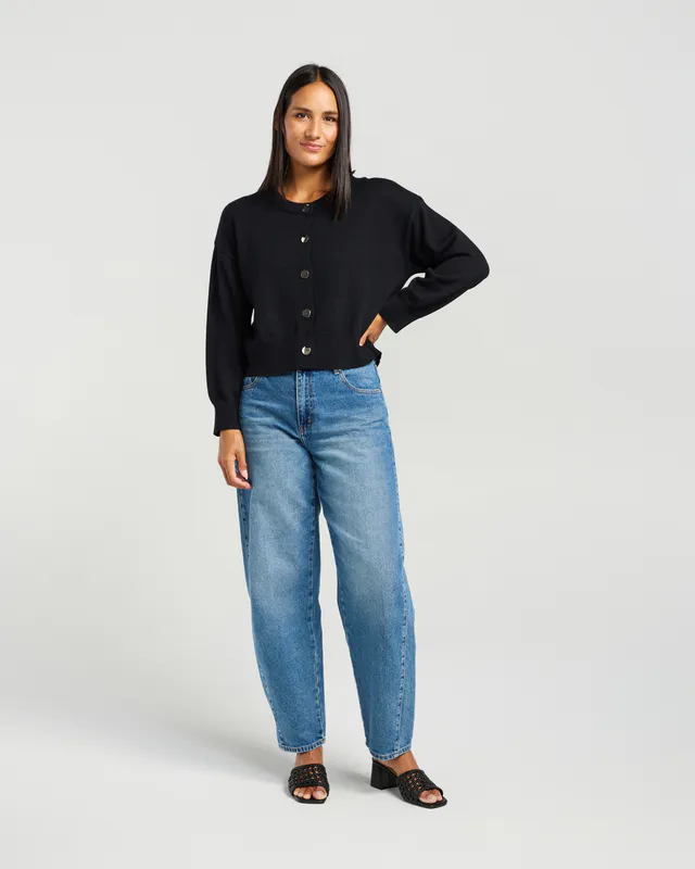 Model wearing Black Poppy Cardi By Et Alia Available at Beetees Nelson