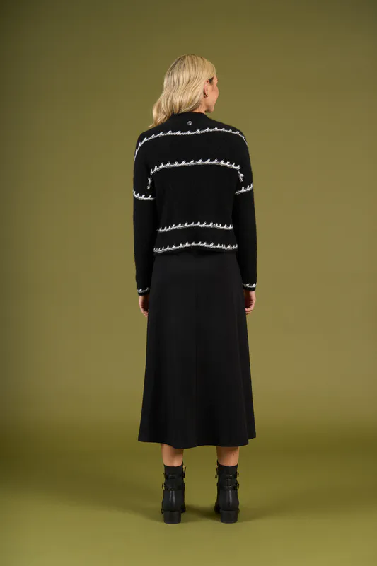 Model wearing Mono Stripe Mackenzie Knit By Charlie Jane Available at Beetees Nelson