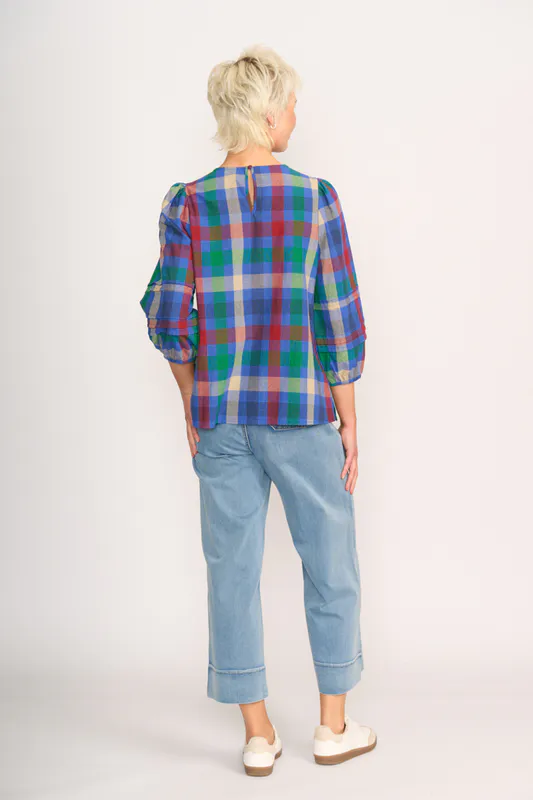 Model wearing Blue Check Top - Pintuck Volume Sleeve By Memo Available at Beetees Nelson
