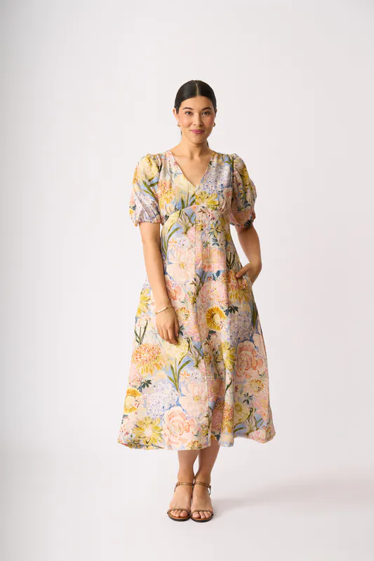 Model wearing Peonies Empire-Ly Yours Dress By Foil Available at Beetees Nelson