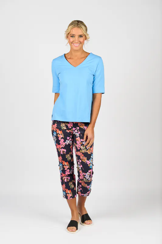 Model wearing Sky V Neck Top By Vassalli Available at Beetees Nelson