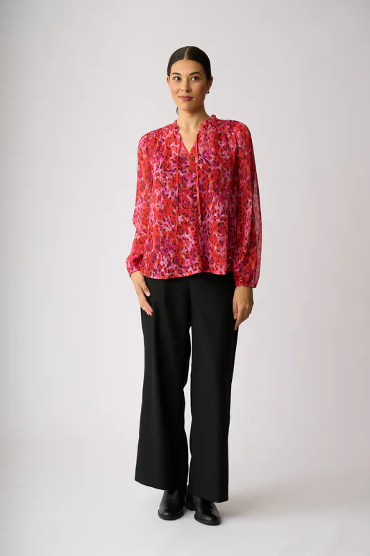 Model wearing Wild Life Shirred Yoke Blouse By Memo Available at Beetees Nelson