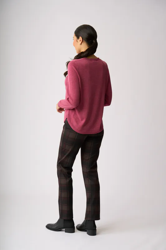 Model wearing Clover Black Scoop Up Jumper By Memo Available at Beetees Nelson