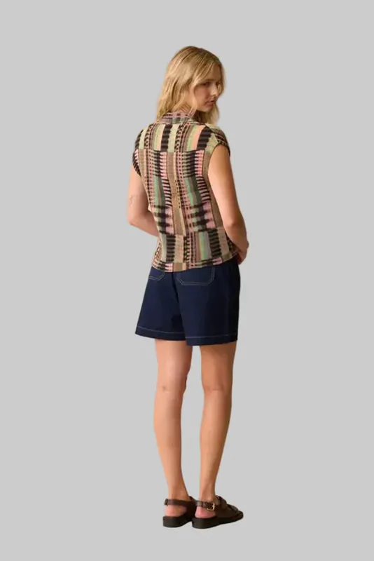 Model wearing Kaleidoscope Kali Shirt By Neris Available at Beetees Nelson