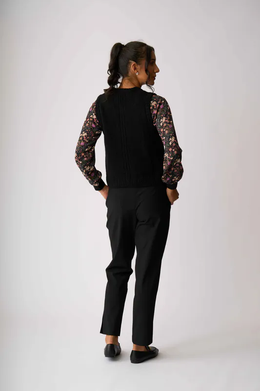 Model wearing Black Rib Button Front Vest By Oh Three Available at Beetees Nelson