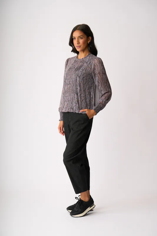 Model wearing Shadow Leopard Pintuck Front, Shirred Cuff Blouse By Memo Available at Beetees Nelson