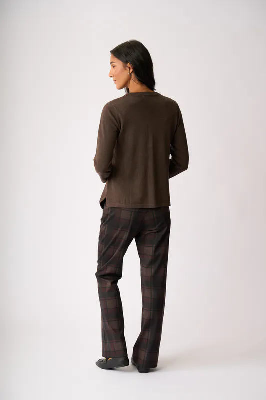 Model wearing Cocoa Henley Sweater By OH Three Available at Beetees Nelson