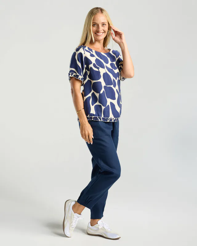 Model wearing Ink Cobblestones Lydia Frill Top By Blackstone Available at Beetees Nelson