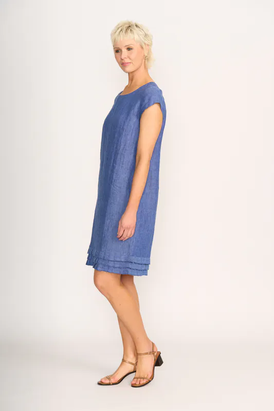 Model wearing Denim Dress - Pleat Dreams By Foil Available at Beetees Nelson
