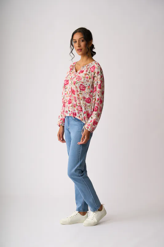 Model wearing Feminine Floral Drawcord Hem Blouse By Memo Available at Beetees Nelson