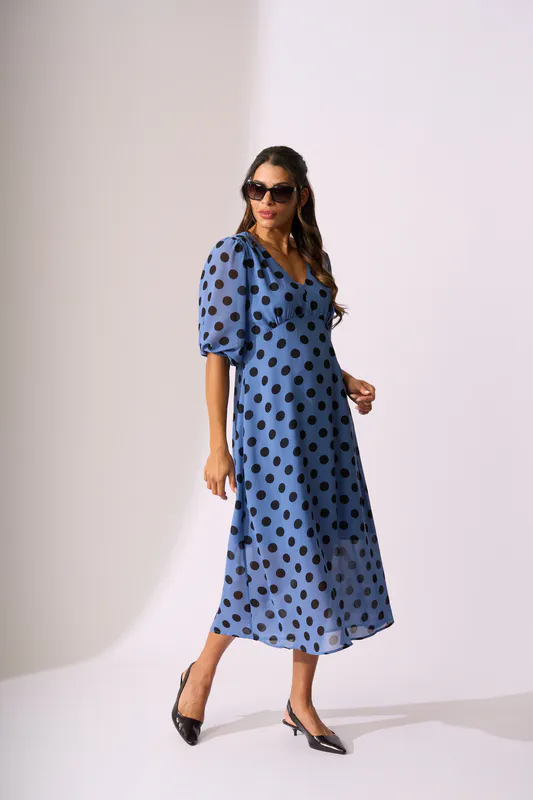 Model wearing Bluebell Spot V Neck Features Dress By Memo Available at Beetees Nelson