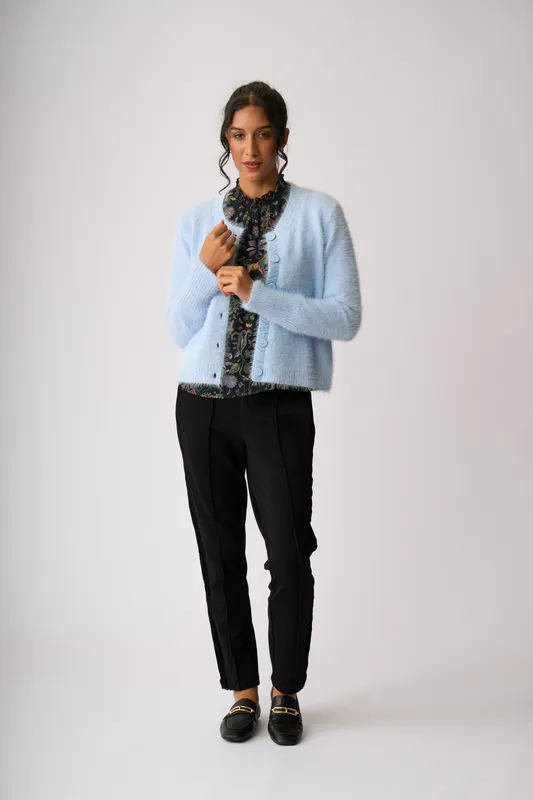 Model wearing Blue Fluffy Scoop Cardigan By Foil Available at Beetees Nelson