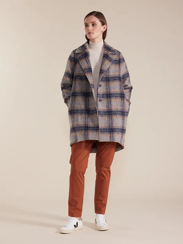 Model wearing Long Sleeve Brushed Check Coat By Marco Polo Available at Beetees Nelson