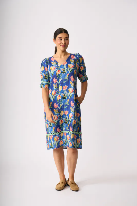 Model wearing Tropical Retreat Trim Time Dress By Foil Available at Beetees Nelson