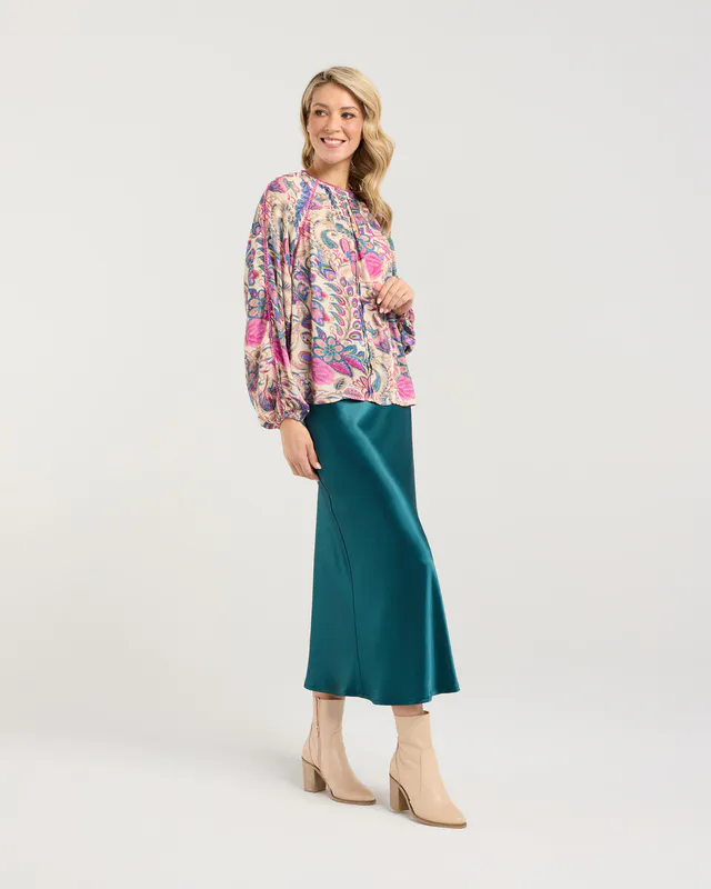 Model wearing Pink Peacock Peggy Lace Trim Reglan Top By Blackstone Available at Beetees Nelson