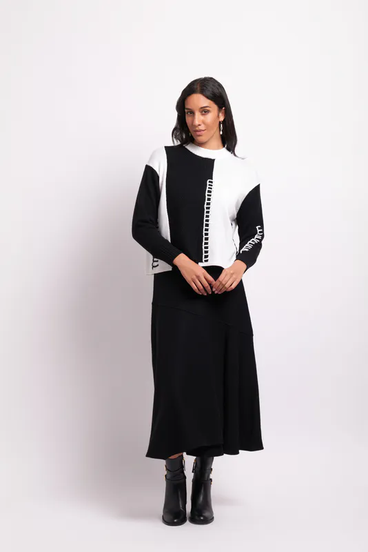 Model wearing Black/Ivory Coloured Blanket Stitch Crew By Foil Available at Beetees Nelson
