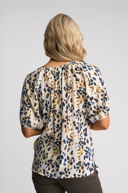 Model wearing Aurora Pitch Top By Vassalli Available at Beetees Nelson