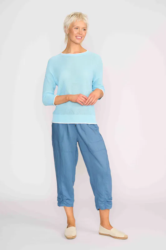 Model wearing Ice Blue & White Contrast Edge Jumper By OH Three Available at Beetees Nelson