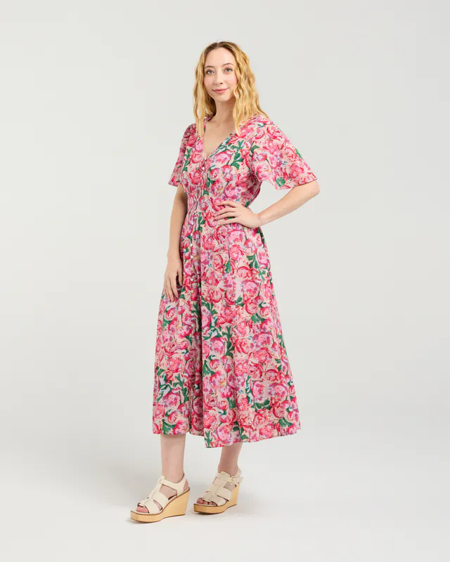 Model wearing Berry Strokes Kate Dress By Seduce Available at Beetees Nelson