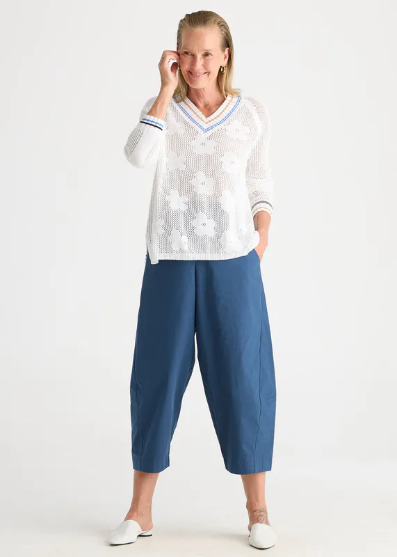 Model wearing White Floral Pointelle Vee By Zaket & Plover Available at Beetees Nelson