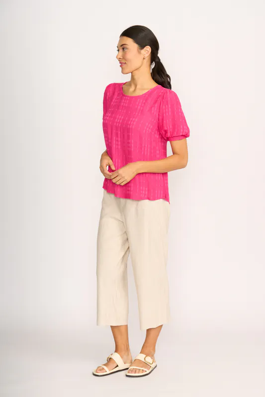 Model wearing Pink Top - Volume Sleeve, Scoop Hem By OH Three Available at Beetees Nelson