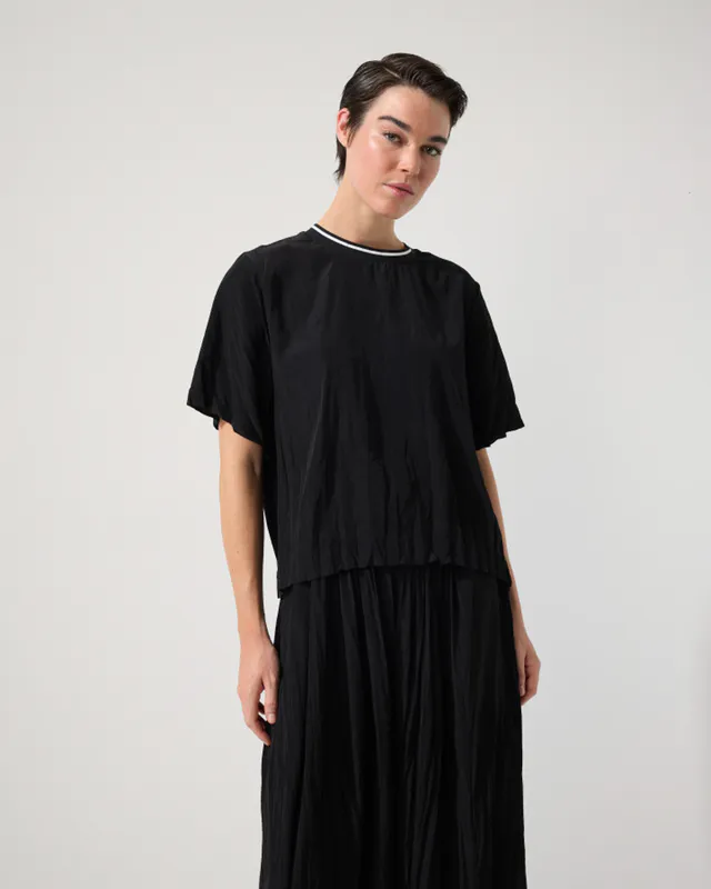 Model wearing Black Crushed Travel Top By Marco Polo Available at Beetees Nelson